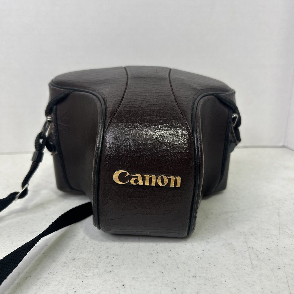 Canon AE-1 Program 35mm SLR Film Camera with FD 50mm 1:1.8 Lens and Case